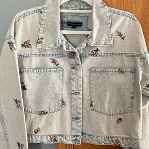 Sincerly Jules Gray and Pink Jean Jacket with pink embroidered flowers.